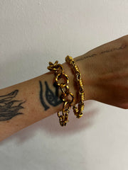 Bracciale dorato cerchi