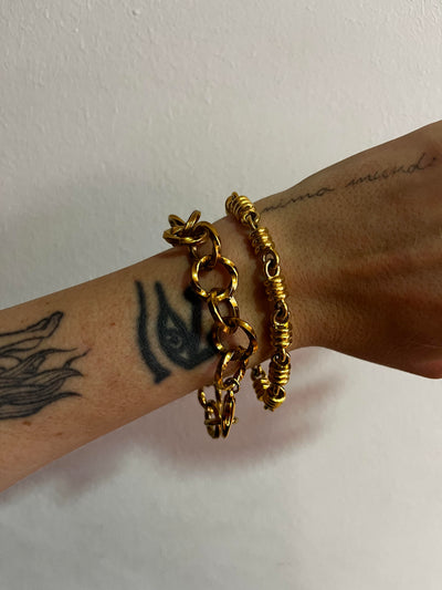 Bracciale dorato cilindri