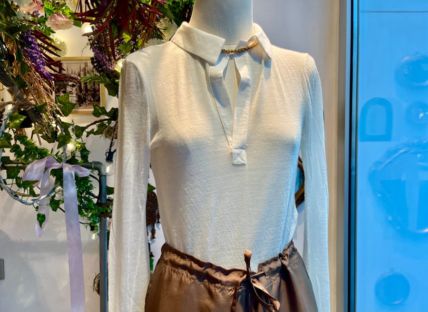 Polo in maglia bianca