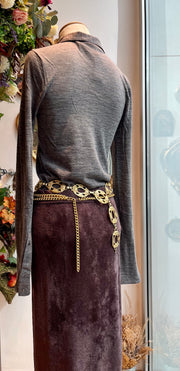 Polo in maglia grigia