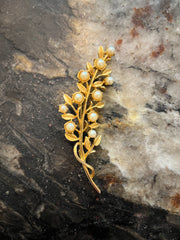 Spilla botanica con perle