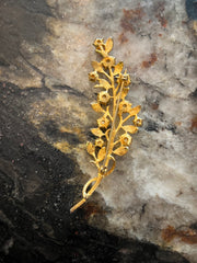 Spilla botanica con perle