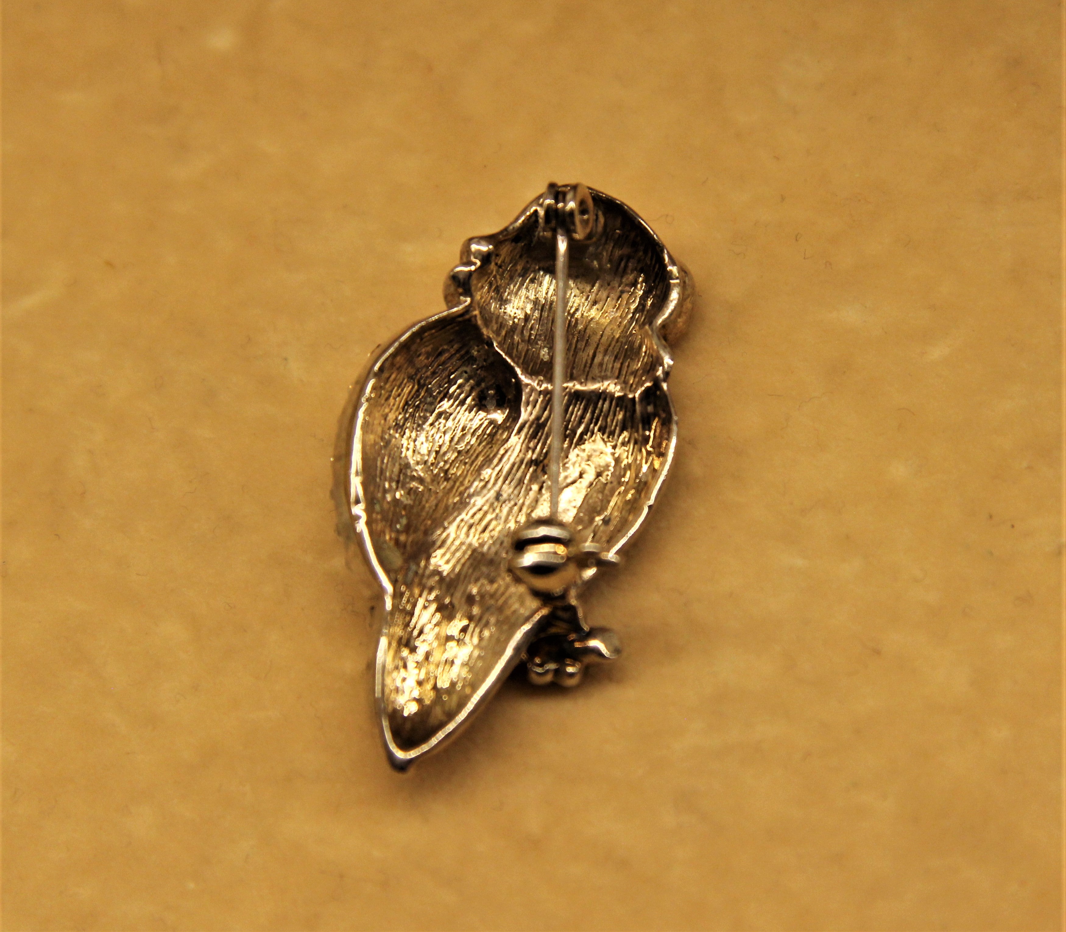 Spilla pappagallo